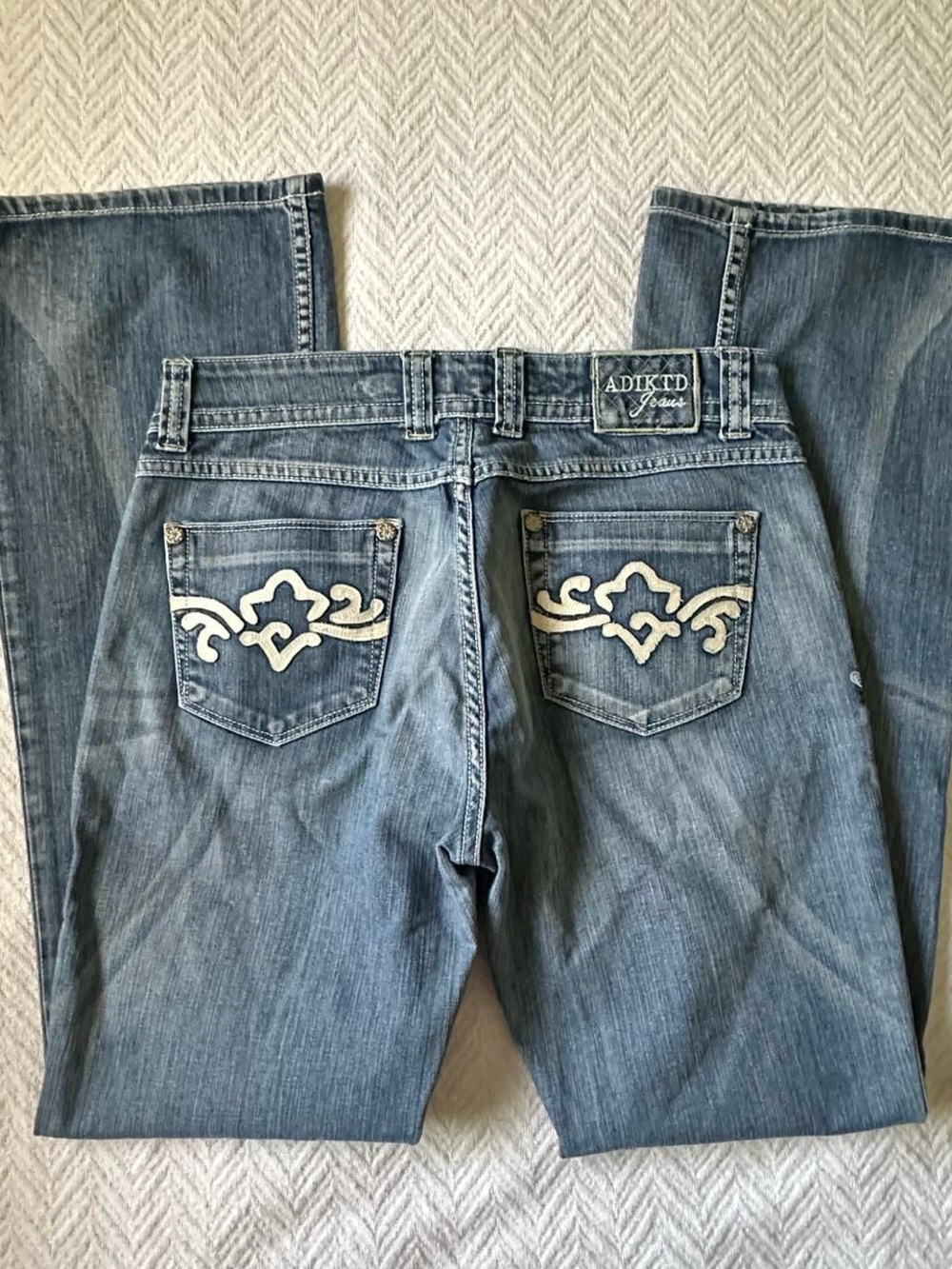 Adiktd Women's Blue Denim Boot Cut Jeans with White Embroidered Pockets